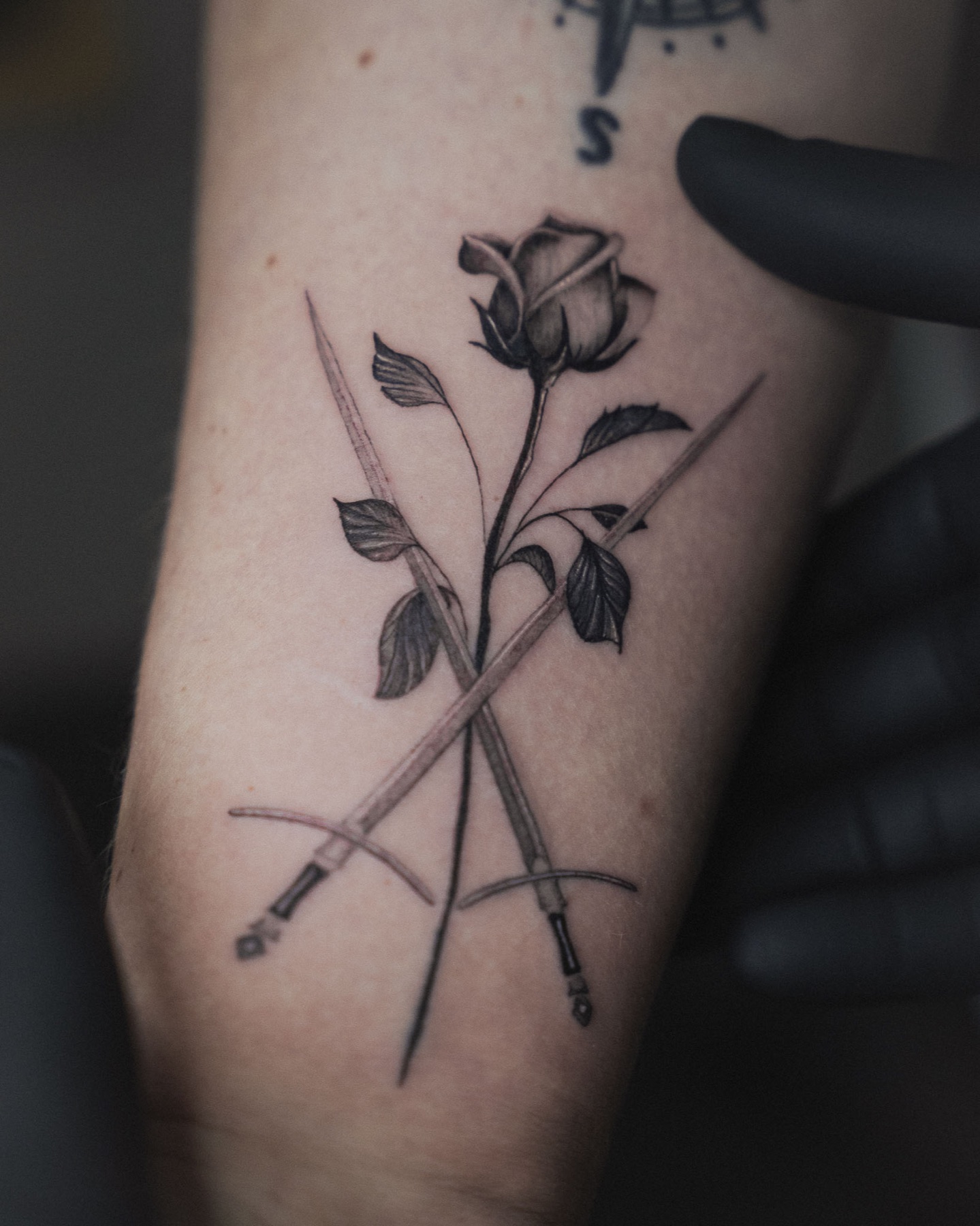 Fine line rose and abstract tattoo